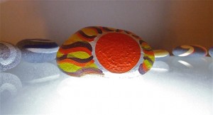 koru hand painted rock